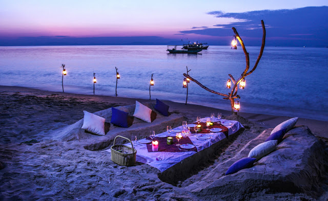 Enjoy the romantic BBQ on the beach at night