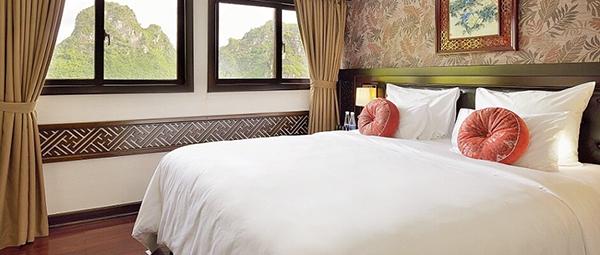 A deluxe bedroom of the Paradise Luxury Cruise in Halong Bay