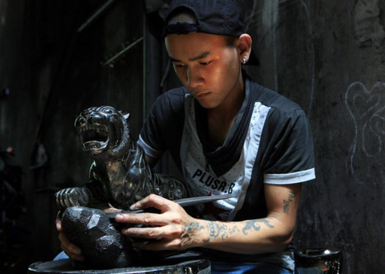 Fine handicraft coal statues Halong Bay