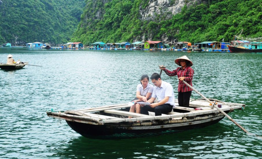 Explore Cua Van Fishing Village on the boat