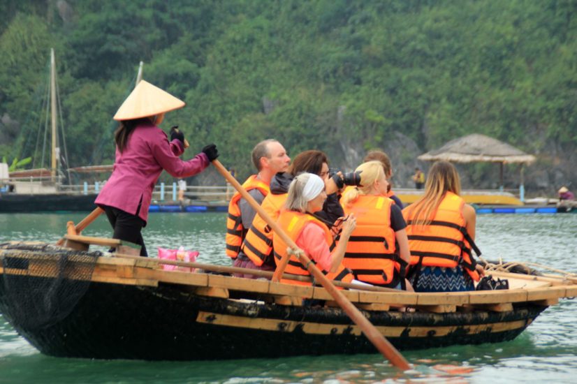 The excitement of tourists when visit Vung Vieng Fishing Village on the boat