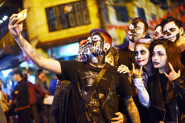 Young people in the Old Quarter on Halloween 