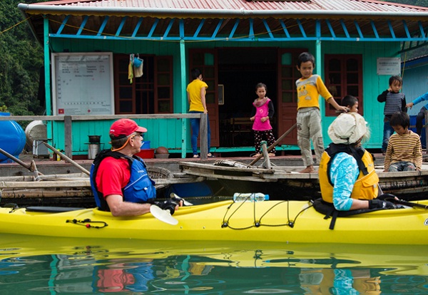Kayaking to meet friendly locals