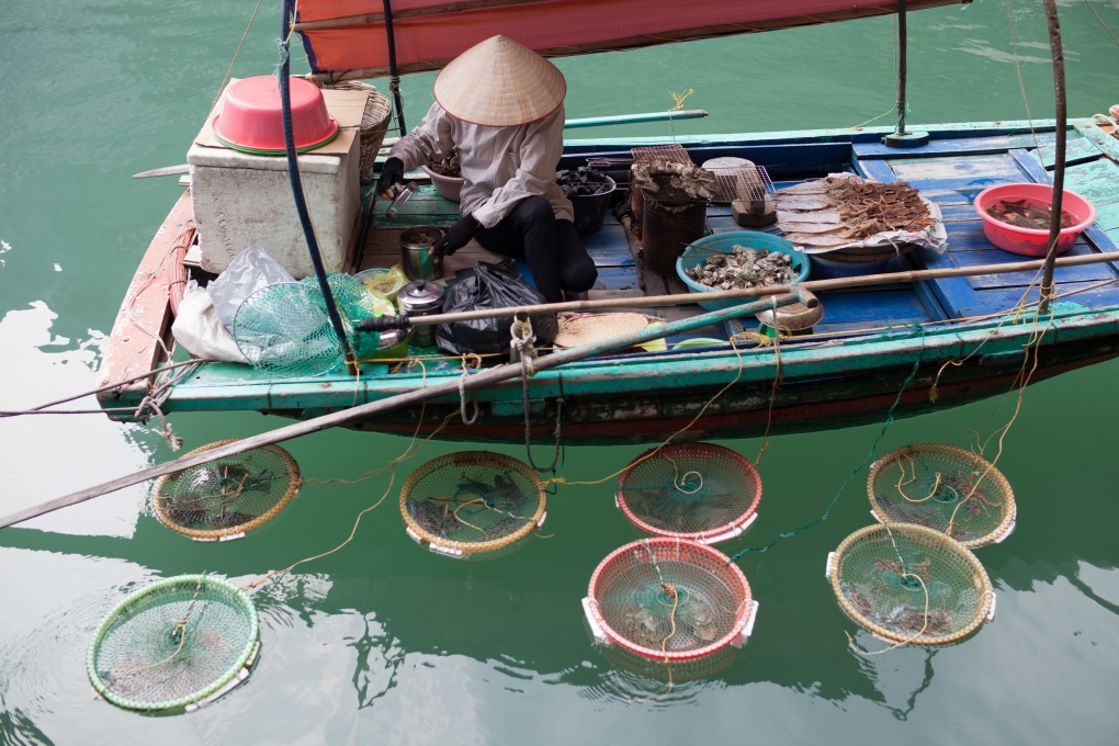 Selling seafood on the boat in Halong bay
