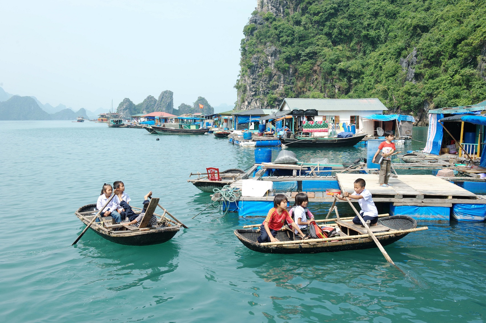 Playful children live on floating boats 