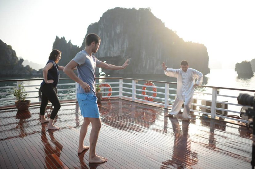 Wake Up Yourself: Tai chi exercises in morning Halong cruise