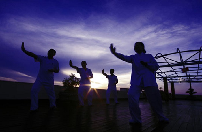 Tai Chi practice on Halong Bay Overnight Cruise